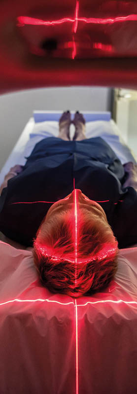 Person undergoing a CAT scan in hospital  PET scan equipment  Medical CT scan of patient 